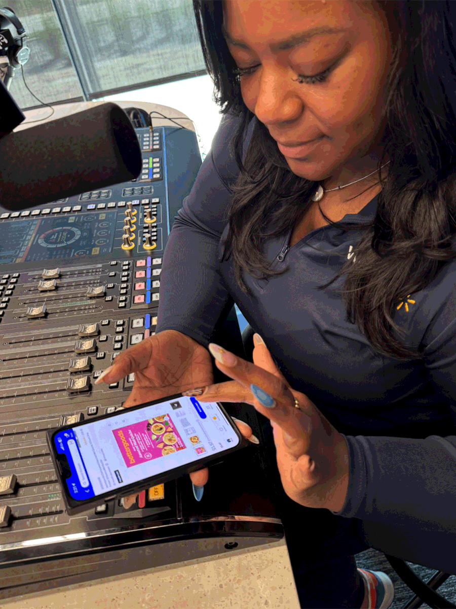 Kirby Gwen finds her favorite items on the Walmart app on her phone.