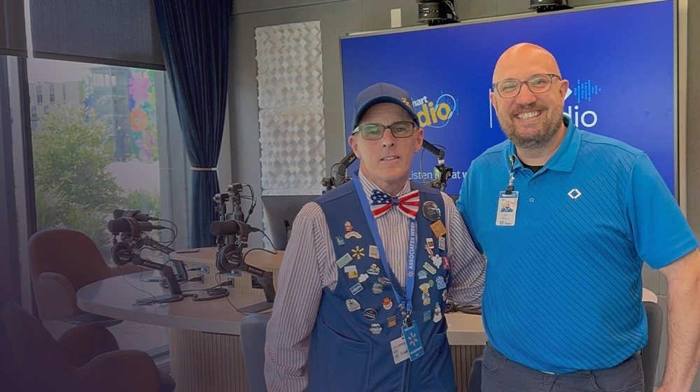 Steven Harris and Bo Woloszyn stand together in the Walmart Radio studio.