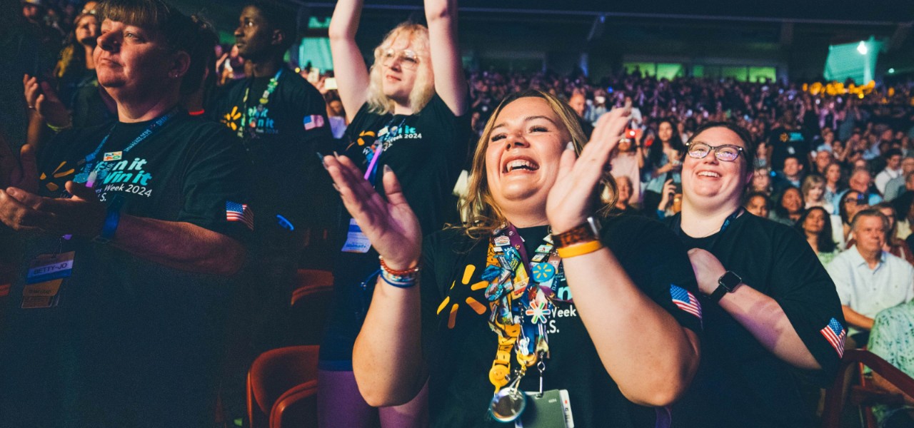 Walmart and Sam’s club associates cheer on the Associate Celebration in Bud Walton Arena in Fayetteville, Arkansas, at Associates Week 2024.